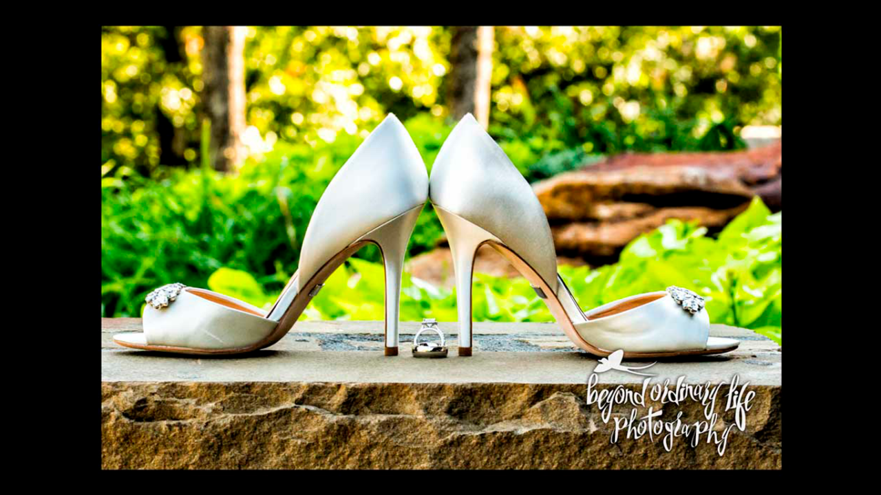 Bridal shoes and wedding rings photo. ©Laurie Biby